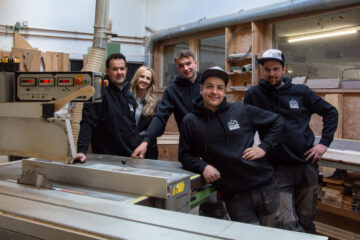 Team Foto in der Werkstatt